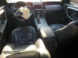 2015 Ford Taurus SEL z VIN 1FAHP2E85FG151155, wystawiony jako Copart lot #77791634 z przebiegiem 224 144 mil mil oraz Szkody całkowita. Historia ofert i sprzedaży dostępna na DreamBid. Obrazek 8.