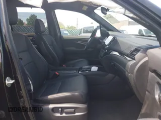 2023 Honda Passport Elite with VIN 5FNYF8H01PB030270, listed as a IAAI auction lot 42667744 with 7,931 mi miles and . Bid and sale history available at DreamBid. Image 5.