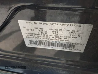 2008 Mazda Mazda3 i Touring Value with VIN JM1BK32F681140372, listed as a IAAI auction lot 42135351 with 160,534 mi miles. Bid and sale history available at carsss.com. Image 9.