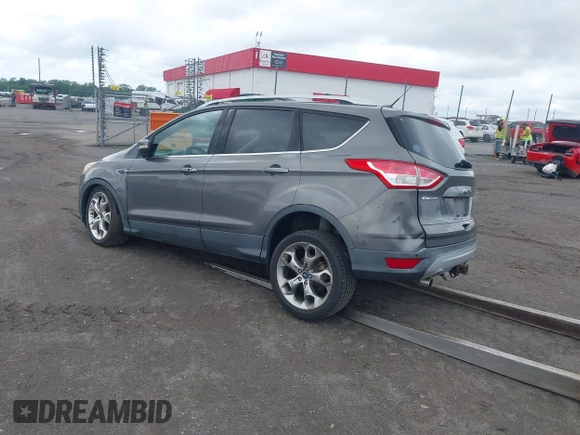 2013 Ford Escape Titanium with VIN 1FMCU0J92DUB36428, listed as a IAAI auction lot 42144682 with 263,600 mi miles and . Bid and sale history available at carsss.com. Image 3.