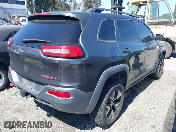 2018 Jeep Cherokee Trailhawk with VIN 1C4PJMBX0JD534722, listed as a IAAI auction lot 41557426 with 109,429 mi miles and . Bid and sale history available at DreamBid. Image 4.