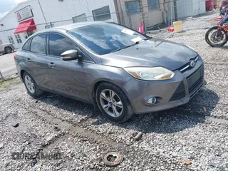 2013 Ford Focus SE with VIN 1FADP3F28DL259529, listed as a IAAI auction lot 42094931 with 124,521 mi miles and . Bid and sale history available at DreamBid. Image 1.