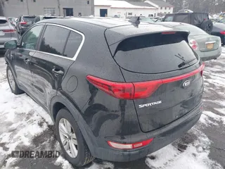 2017 Kia Sportage LX with VIN KNDPMCAC9H7187268, listed as a IAAI auction lot 41631107 with 107,135 mi miles and . Bid and sale history available at carsss.com. Image 3.