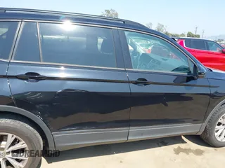 2018 Volkswagen Tiguan S with VIN 3VV1B7AX7JM092033, listed as a IAAI auction lot 42373619 with 124,775 mi miles and . Bid and sale history available at DreamBid. Image 13.