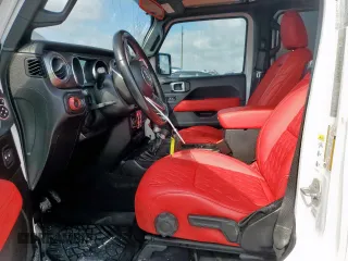 2019 Jeep Wrangler Unlimited Sahara z VIN 1C4HJXEG3KW635681, wystawiony jako Copart lot #60734065 z przebiegiem 75 020 mil mil oraz Szkoda całkowita • Salvage title. Historia ofert i sprzedaży dostępna na DreamBid. Obrazek 7.