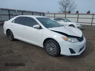 2013 Toyota Camry L with VIN 4T1BF1FK6DU269362, listed as a IAAI auction lot 42004165 with 184,876 mi miles. Bid and sale history available at carsss.com. Image 1.