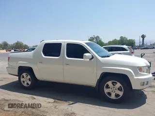 2012 Honda Ridgeline RTL z VIN 5FPYK1F57CB455267, wystawiony jako IAAI lot #42462296 z przebiegiem 186 451 mil mil oraz . Historia ofert i sprzedaży dostępna na DreamBid. Obrazek 13.