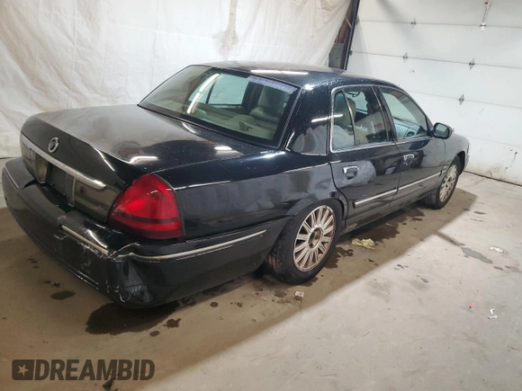 2010 Mercury Grand Marquis LS z VIN 2MEBM7FV6AX628705, wystawiony jako Copart lot #52185105 z przebiegiem 139 485 mil mil oraz Szkody całkowita. Historia ofert i sprzedaży dostępna na DreamBid. Obrazek 3.