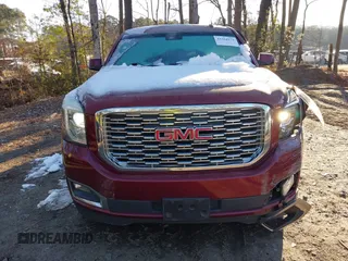 2019 GMC Yukon Denali with VIN 1GKS2CKJ8KR137636, listed as a IAAI auction lot 41264171 with 153,136 mi miles. Bid and sale history available at carsss.com. Image 12.