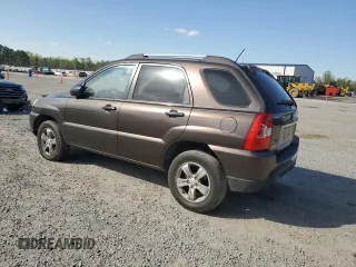 2009 Kia Sportage LX with VIN KNDJF724297573255, listed as a Copart auction lot 51300095 with 199,362 mi miles and Salvage Title. Bid and sale history available at carsss.com. Image 2.