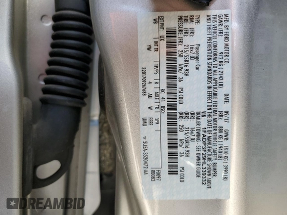 2017 Ford Focus SE z VIN 1FADP3F29HL339332, wystawiony jako Copart lot #56556735 z przebiegiem 93 050 mil mil oraz Szkoda całkowita • Salvage title. Historia ofert i sprzedaży dostępna na DreamBid. Obrazek 12.