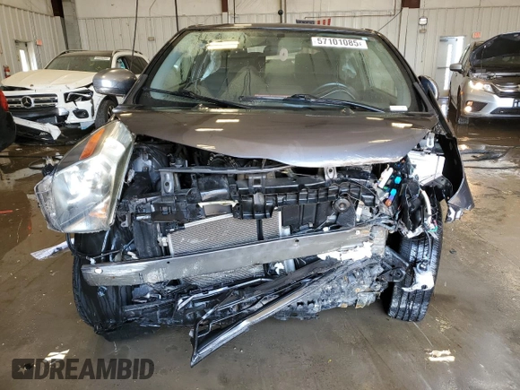 2012 Scion iQ with VIN JTNJJXB07CJ018013, listed as a Copart auction lot 57101085 with 91,370 mi miles and Non repairable. Bid and sale history available at DreamBid. Image 5.
