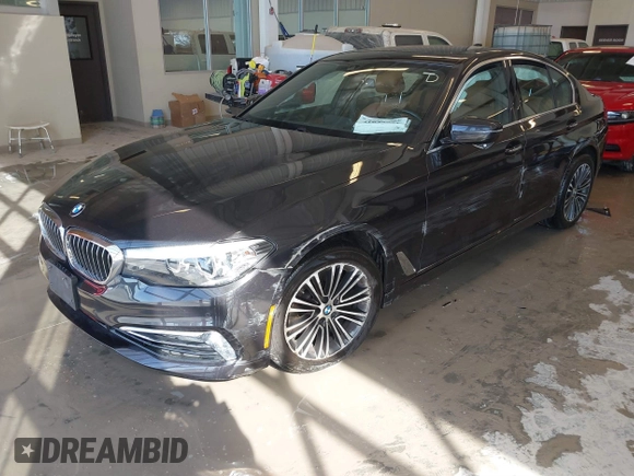2018 BMW 5 Series 530i xDrive with VIN WBAJA7C55JWA73459, listed as a IAAI auction lot 41634921 with 64,759 mi miles and . Bid and sale history available at DreamBid. Image 2.