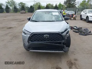 2023 Toyota Corolla Cross L with VIN 7MUAAABG4PV063424, listed as a IAAI auction lot 42119578 with 14,743 mi miles and . Bid and sale history available at DreamBid. Image 13.