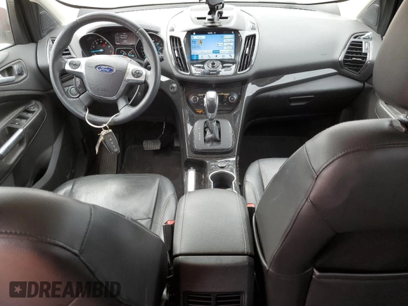 2016 Ford Escape Titanium with VIN 1FMCU9JX1GUC72265, listed as a Copart auction lot 48958575 with 65,313 mi miles and Salvage Title. Bid and sale history available at carsss.com. Image 8.