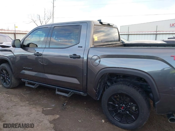 2023 Toyota Tundra 4WD SR5 with VIN 5TFLA5DB7PX067828, listed as a IAAI auction lot 41402003 with 26,218 mi miles. Bid and sale history available at carsss.com. Image 14.
