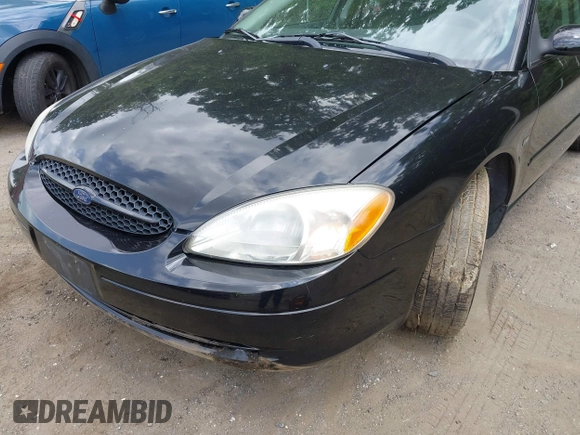 2002 Ford Taurus SES Standard with VIN 1FAFP55S92G250401, listed as a IAAI auction lot 42432014 with 231,695 mi miles and . Bid and sale history available at DreamBid. Image 6.