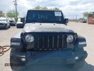 2021 Jeep Gladiator Willys with VIN 1C6HJTAG7ML523718, listed as a IAAI auction lot 42206058 with 48,071 mi miles and . Bid and sale history available at DreamBid. Image 12.