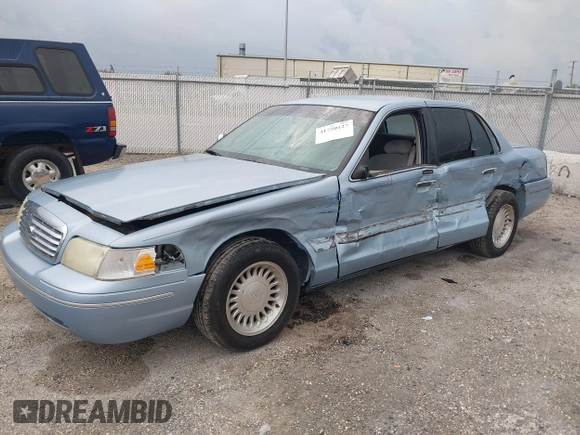 1999 Ford Crown Victoria z VIN 2FAFP73WXXX221069, wystawiony jako IAAI lot #41750127 z przebiegiem 177 142 mil mil oraz . Historia ofert i sprzedaży dostępna na DreamBid. Obrazek 17.