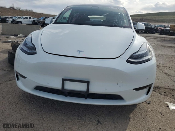 2021 Tesla Model Y Long Range with VIN 5YJYGDEEXMF299515, listed as a Copart auction lot 51978555 with 30,459 mi miles and Salvage Title. Bid and sale history available at carsss.com. Image 5.