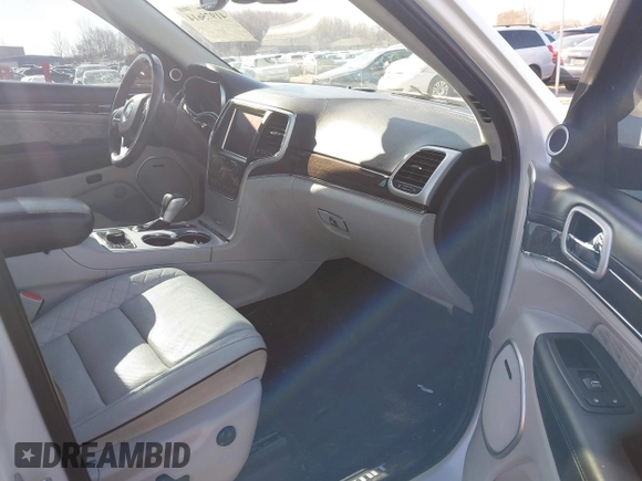 2018 Jeep Grand Cherokee Summit with VIN 1C4RJFJT4JC212819, listed as a IAAI auction lot 41975614 with 88,112 mi miles and . Bid and sale history available at DreamBid. Image 5.