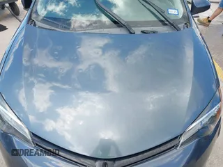 2018 Toyota Corolla L with VIN 5YFBURHE1JP832911, listed as a IAAI auction lot 42237901 with 92,158 mi miles and . Bid and sale history available at DreamBid. Image 6.