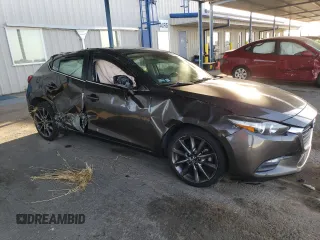 2018 Mazda 3 Touring z VIN 3MZBN1L30JM195471, wystawiony jako Copart lot #57497115 z przebiegiem 147 899 mil mil oraz Szkoda całkowita • Salvage title. Historia ofert i sprzedaży dostępna na DreamBid. Obrazek 4.