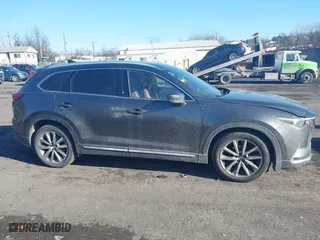 2016 Mazda CX-9 Signature with VIN JM3TCBEY3G0104689, listed as a IAAI auction lot 41257053 with 116,486 mi miles. Bid and sale history available at carsss.com. Image 13.