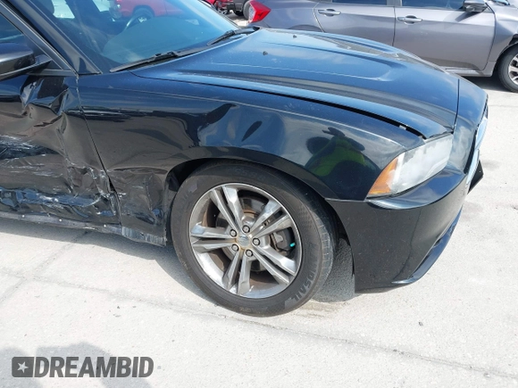 2013 Dodge Charger SXT z VIN 2C3CDXJG2DH528683, wystawiony jako IAAI lot #41644348 z przebiegiem 124 157 mil mil oraz . Historia ofert i sprzedaży dostępna na DreamBid. Obrazek 6.