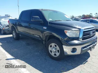 2012 Toyota Tundra with VIN 5TFEY5F15CX118021, listed as a IAAI auction lot 41827932 with 157,328 mi miles and . Bid and sale history available at DreamBid. Image 1.