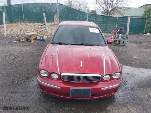 2005 Jaguar X-Type 3.0L with VIN SAJWA51A05WE55760, listed as a IAAI auction lot 41732516 with NaN miles. Bid and sale history available at carsss.com. Image 13.