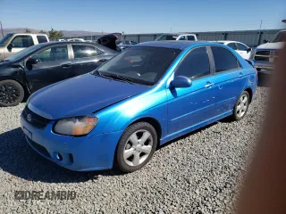 2007 Kia Spectra EX with VIN KNAFE122575008783, listed as a Copart auction lot 73116174 with 165,826 mi miles and Salvage Title. Bid and sale history available at carsss.com. Image 1.