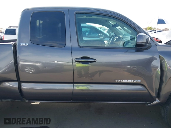 2018 Toyota Tacoma SR with VIN 5TFRX5GN8JX116802, listed as a IAAI auction lot 41879503 with 86,448 mi miles and . Bid and sale history available at DreamBid. Image 14.