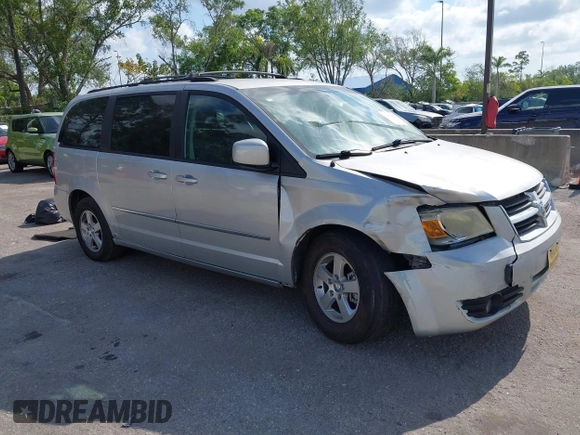 2010 Dodge Grand Caravan SXT with VIN 2D4RN5D15AR196651, listed as a IAAI auction lot 42105957 with 244,374 mi miles and . Bid and sale history available at DreamBid. Image 1.