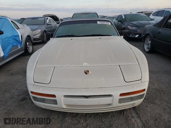 1990 Porsche 944 with VIN WP0CB2949LN481351, listed as a Copart auction lot 75335194 with 70,964 mi miles and Salvage title. Bid and sale history available at DreamBid. Image 5.