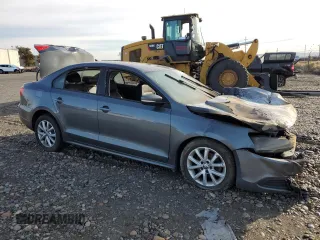 2012 Volkswagen Jetta Sedan SE w/Convenience & Sunroof PZEV with VIN 3VWBP7AJ4CM362822, listed as a Copart auction lot 77220104 with 0 mi miles and Salvage Title. Bid and sale history available at carsss.com. Image 4.