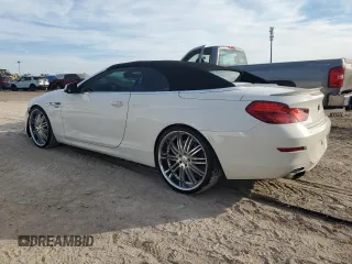 2012 BMW 6 Series 650i z VIN WBALZ3C56CDL72058, wystawiony jako Copart lot #43246815 z przebiegiem 133 048 mil mil oraz Tytuł czysty. Historia ofert i sprzedaży dostępna na DreamBid. Obrazek 2.