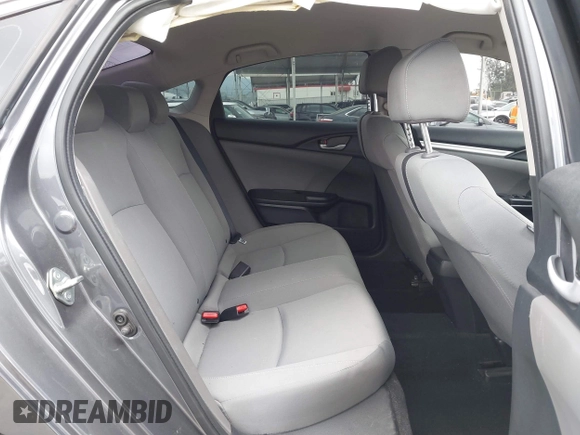 2020 Honda Civic LX with VIN 2HGFC2F64LH576765, listed as a IAAI auction lot 41881444 with 32,129 mi miles and . Bid and sale history available at DreamBid. Image 8.