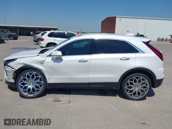 2024 Cadillac XT4 AWD Premium Luxury with VIN 1GYFZDR40RF100102, listed as a IAAI auction lot 41987175 with 4,935 mi miles and . Bid and sale history available at DreamBid. Image 14.