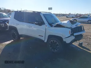 2023 Jeep Renegade Trailhawk z VIN ZACNJDC17PPP43822, wystawiony jako IAAI lot #41081187 z przebiegiem 9 256 mil mil oraz . Historia ofert i sprzedaży dostępna na DreamBid. Obrazek 1.