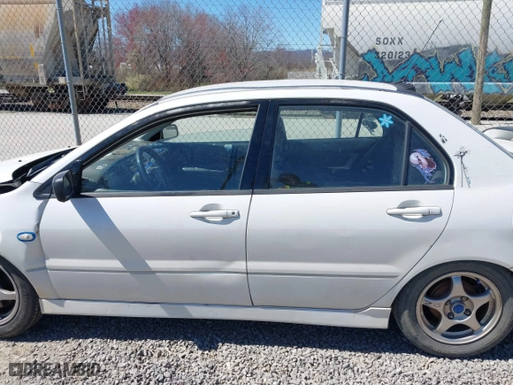 2002 Mitsubishi Lancer OZ-Rally with VIN JA3AJ86E42U039140, listed as a IAAI auction lot 41853888 with 328,181 mi miles. Bid and sale history available at carsss.com. Image 14.