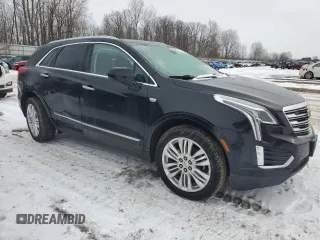 2019 Cadillac XT5 Premium Luxury AWD z VIN 1GYKNFRS1KZ114339, wystawiony jako Copart lot #44032245 z przebiegiem 77 484 mil mil oraz Czysty tytuł • Clean title. Historia ofert i sprzedaży dostępna na DreamBid. Obrazek 4.