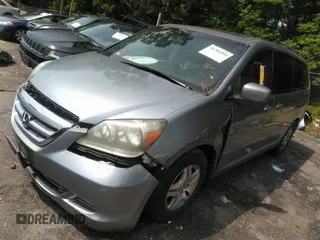 2006 Honda Odyssey EX-L with VIN 5FNRL38706B107724, listed as a IAAI auction lot 39245592 with 186,885 mi miles. Bid and sale history available at carsss.com. Image 2.
