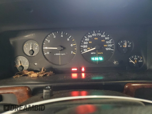 1997 Jeep Grand Cherokee Limited with VIN 1J4GZ78Y1VC706353, listed as a Copart auction lot 41437085 with 163,675 mi miles and Salvage Title. Bid and sale history available at carsss.com. Image 9.