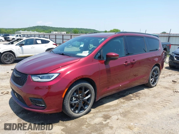 2023 Chrysler Pacifica Touring L with VIN 2C4RC1BG7PR513017, listed as a IAAI auction lot 42441272 with 23,310 mi miles and . Bid and sale history available at DreamBid. Image 17.