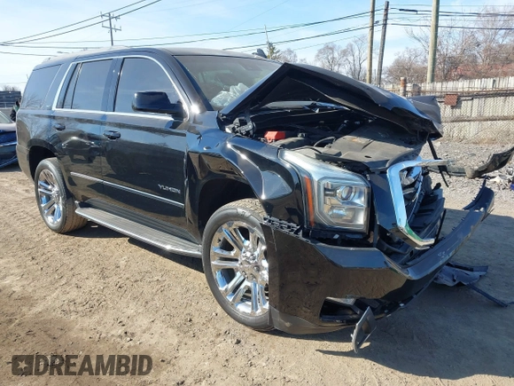 2016 GMC Yukon SLT with VIN 1GKS2BKC5GR253038, listed as a IAAI auction lot 41790030 with 101,039 mi miles. Bid and sale history available at carsss.com. Image 1.
