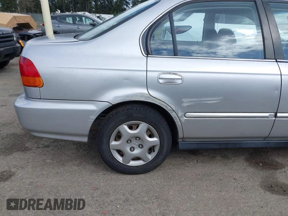 1998 Honda Civic EX with VIN 2HGEJ864XWH627385, listed as a IAAI auction lot 41933830 with 190,900 mi miles. Bid and sale history available at carsss.com. Image 6.