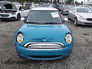 2009 MINI Cooper Hardtop with VIN WMWMF33569TW70413, listed as a IAAI auction lot 41776589 with 85,394 mi miles. Bid and sale history available at carsss.com. Image 12.