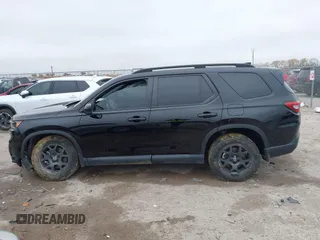 2023 Honda Pilot TrailSport with VIN 5FNYG1H63PB051646, listed as a IAAI auction lot 41069614 with 28,730 mi miles. Bid and sale history available at carsss.com. Image 14.