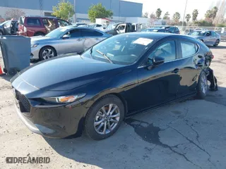 2021 Mazda Mazda3 Hatchback 2.5 S with VIN JM1BPAJLXM1314726, listed as a IAAI auction lot 41193185 with 43,546 mi miles. Bid and sale history available at carsss.com. Image 2.